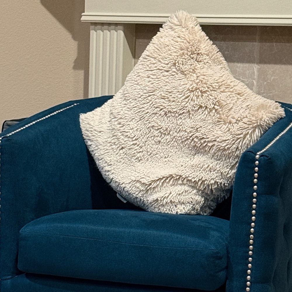 Plush Blue Armchair with Cream Pillow